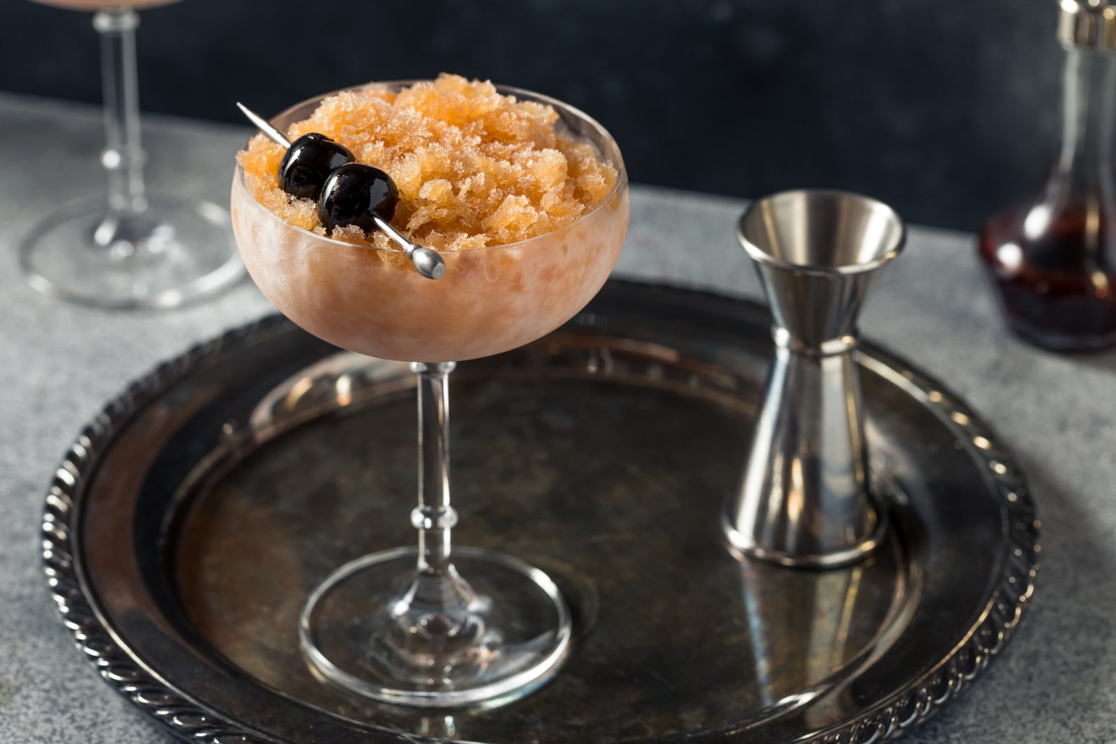 Boozy Frozen Manhattan Slushie Cocktail with Bourbon and Cherries