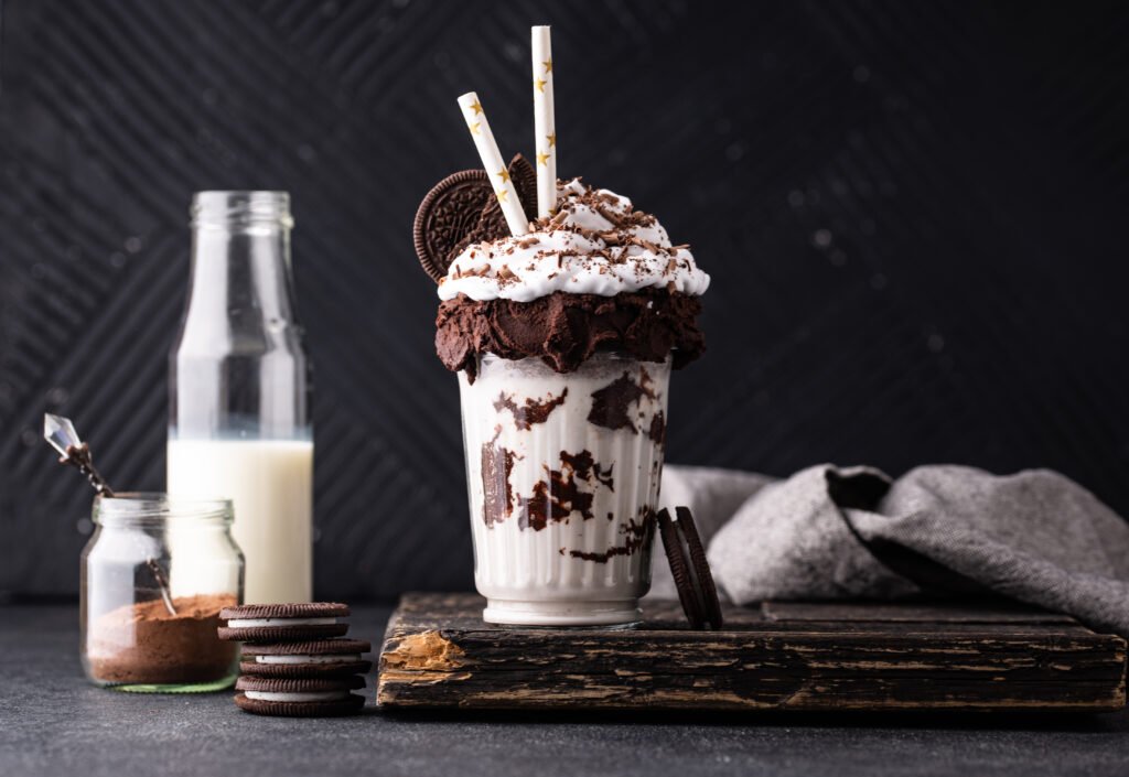 Chocolate milkshake topped with cream